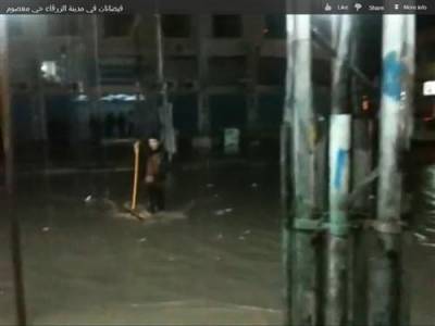 بالفيديو.. فيضانات في حي معصوم بالزرقاء