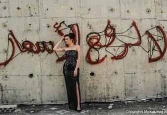 بالصور عروض أزياء لآرقى دور العرض العالمية بأحياء عمان الفقيرة