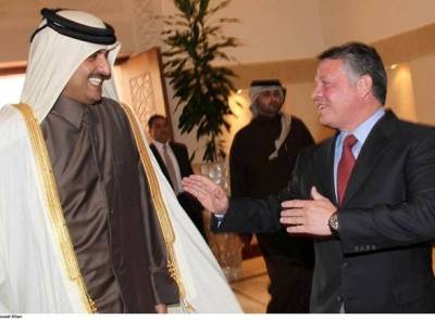 لقاء الملك وتميم .. صور