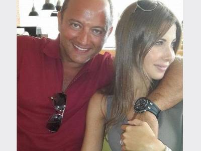 يوم حميم للفنانه نانسي عجرم  وهي باحضان زوجها  شاهد الصوره