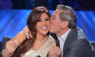 صورة علي جابر يقبل نجوى كرم تعرضها للإنتقاد من الجمهور