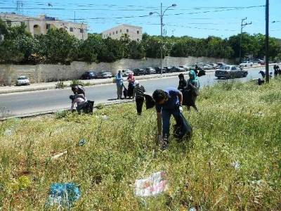 حملة نظافة تحت شعار  أنا منتمنٍ للوطن  في عجلون