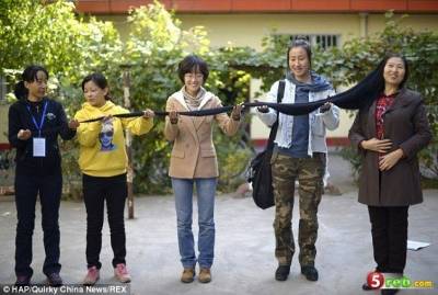 بالصور... أطول شعر إمرأة في العالم