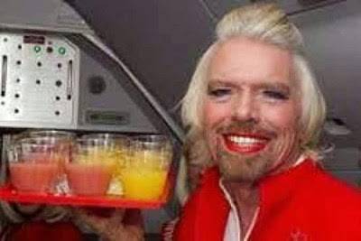 بالصور.. ملياردير بريطاني يعمل مضيفة طيران بسبب رهان