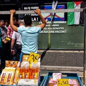 صاحب مقهى بلجيكي غاضب : الدخول للكلاب مسموح .. وللصهاينة ممنوع