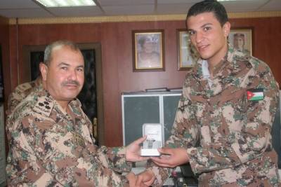 تهنئة بالسلامة للبطل العالمي محمد عامر الهزيم