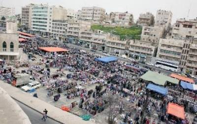 سوق العبدلي موقفا للمركبات والنزول الى البلد بحافلات