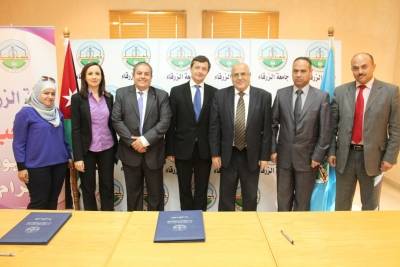 اتفاقية تعاون بين جامعة الزرقاء والمعهد الديمقراطي الوطني