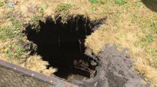 الأرض تنشق وتبتلع أسترالية أثناء نشرها الغسيل