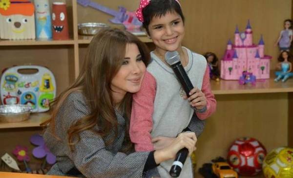 نانسي عجرم تحقق أمنية نور في الحسين للسرطان