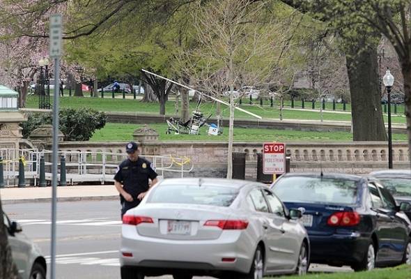 ساعي بريد يتبنى إسقاط مروحية في حديقة مجلس الشيوخ الأمريكي