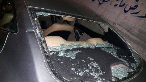 بالصور..... تفاصيل الاعتداء على المرشح محمود عليان وتكسير مركبته