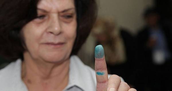 صور من عملية الاقتراع