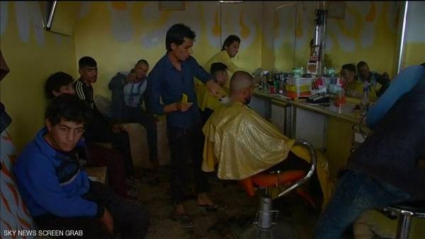 صفوف لحلق اللحى بعد طرد داعش شرقي الموصل