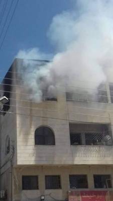 بالصور : حريق منزل في عمان ... والدفاع المدني يتدخل