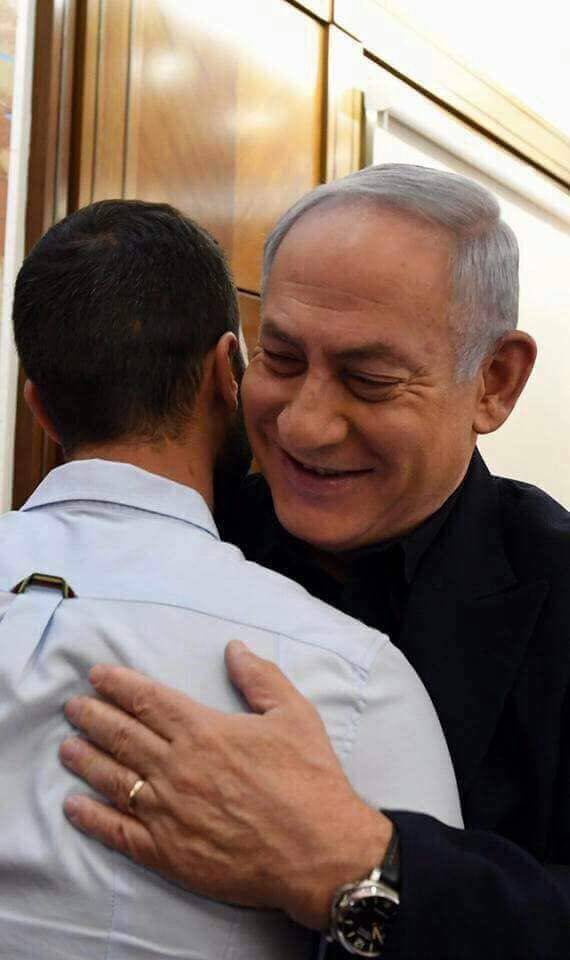 النتنياهو يستقبل قاتل الأردنيين بالرابية كزعيم