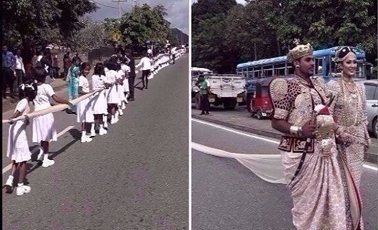 350 طالباً لحمل ذيل فستان عروس