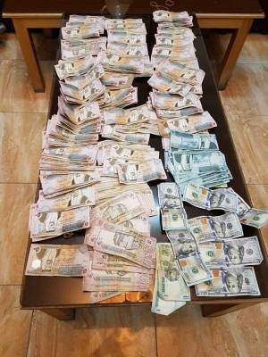 ضبط 3 متورطين بالسطو على مكتب بريد الضليل بينهم موظف وفتاة  بالصور