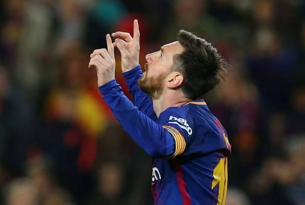 ثلاثية ميسي تقود برشلونة لرقم قياسي في الدوري الاسباني