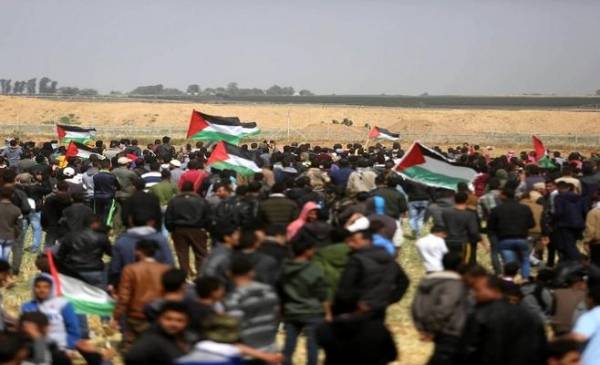 18 شهيد وأكثر من 918 مصاب بمسيرة العودة المليونية في غزة