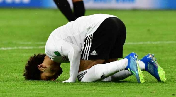 روسيا تهزم مصر وتصل دور الـ16 بالمونديال ...صور