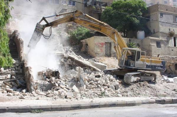 ازالة 13 مبنى مهجور آيل للسقوط في العاصمة عمان  صور