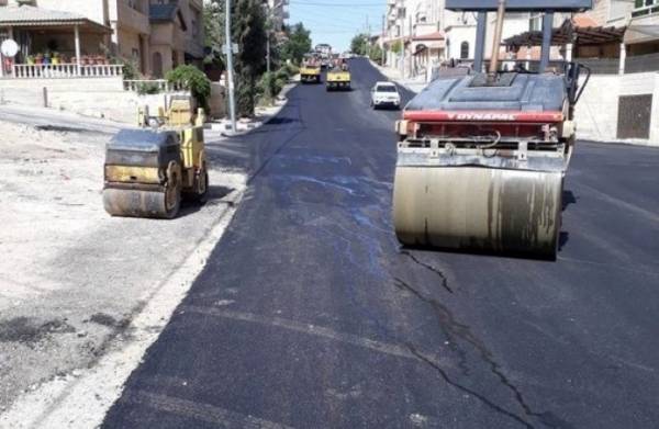 أمانة عمان تواصل أعمال التعبيد ضمن الخطة السنوية للمناطق