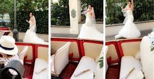 عروسة تخوض تحدي كيكي بفستان الزفاف (فيديو)