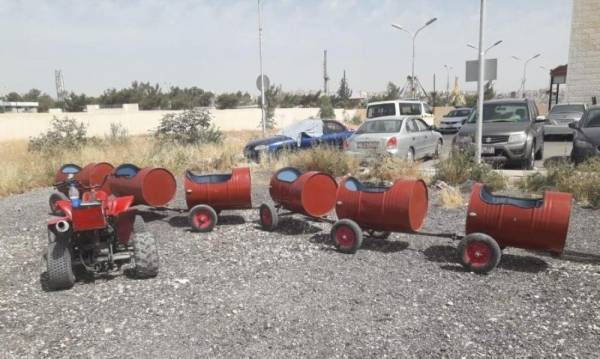 الرصيفة : ضبط دراجة تجر براميل على شكل قطار