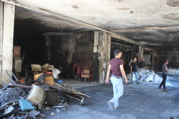 جولة بالصور لـاخبار البلد في مجمع ضاحية الروضة الذي تعرض للحرق