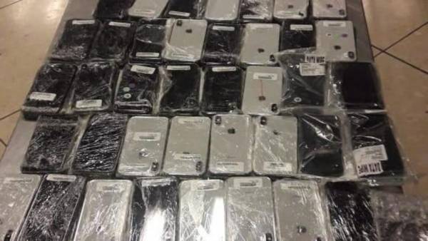 احباط تهريب أكثر من 400 جهاز خلوي في مطار الملكة علياء الدولي