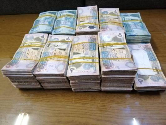 الامن يستعيد 267 الف دينار والقبض على المتورطين