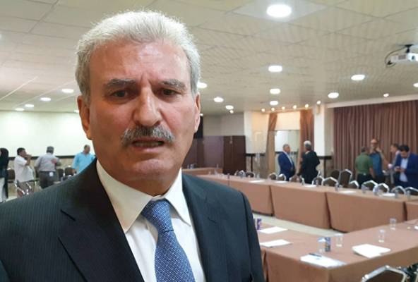 موظفو الوطني لحقوق الانسان يرفضون انهاء خدمات بريزات .. (صور)