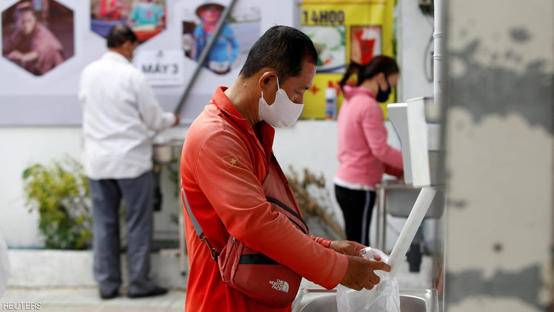 في زمن كورونا...صراف آلي يقدم الأرز بدل النقود