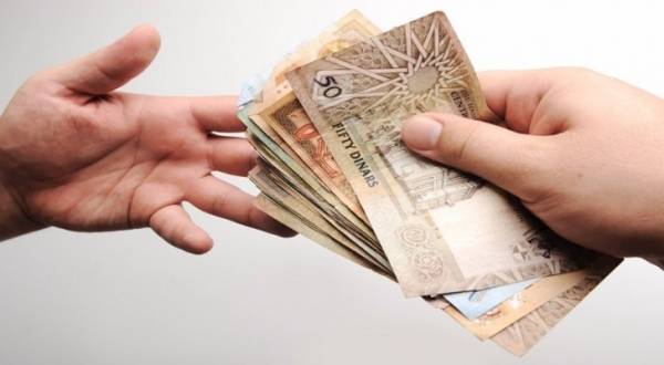 اقتصاديون يعلقون على امكانية  تأجيل توزيع الأرباح في شركات المساهمة العامة