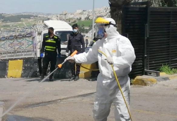 تعقيم الحي المعزول في دير علا