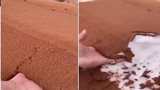 ثلوج مدفونة تحت الرمال في جبال تبوك  فيديو