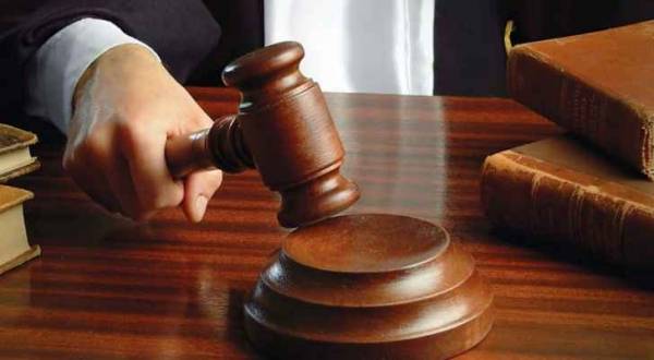 بنك أجنبي يحجز على تاجرين كبيرين في عمان