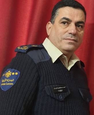 العقيد العرمان في حديث عن حصوله على جائزة الموظف المثالي