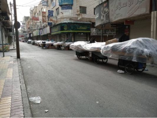 إربد: آلاف البسطات تفرض سيطرتها على شوارع الوسط التجاري