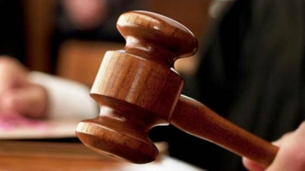 الحبس لـ 3 اشخاص وبراءة نائب بقضية استعمال دمغة مزورة