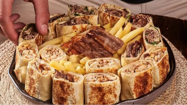 ما قصة وجبات الشاورما ذات اللون الأسود؟... توضيح رسمي يحسم الجدل