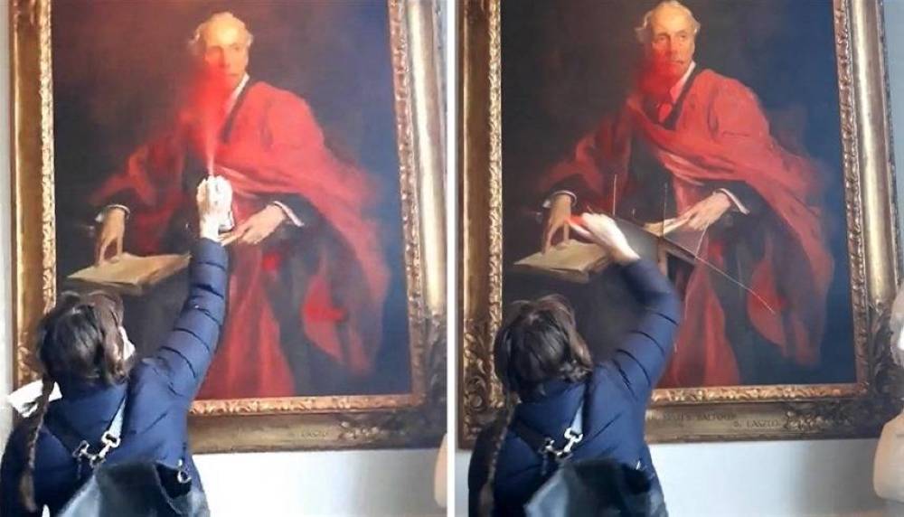 ناشطة بريطانية تتلف لوحة بلفور تضامناً مع غزة