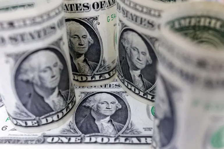 ما علاقة الدولار الأميركي بالفوضى في الأسواق؟